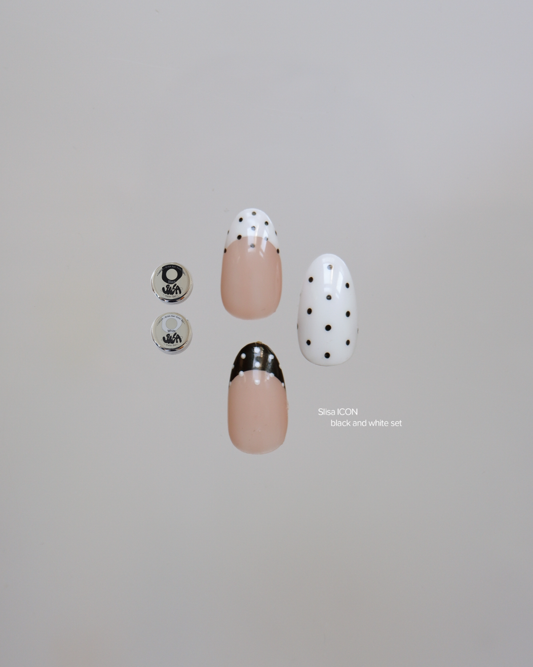 Polka dot nail designs made with SIiSA Icon Set Black and White Art Gels